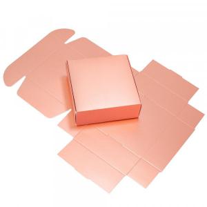 emballage or rose carton pour une fête d'anniversaire