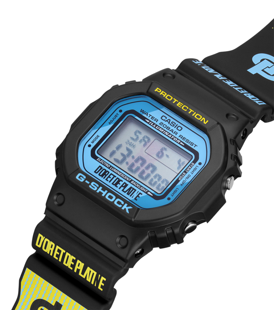 Gros plan Casio G-Shock DW 5600 édition D'OR et DE PLATINE